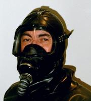 Head and shoulders portrait of me in Rubber wearing a Firefighter's mask